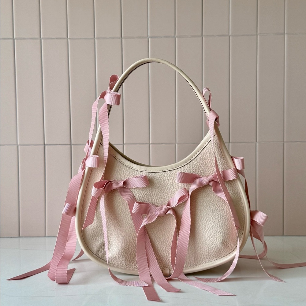 Coachtopia Ergo Handbag in Pink and Beige